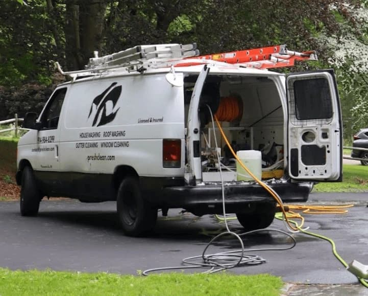 Willoughby Power Washing professionals cleaning commercial fleet in Willoughby